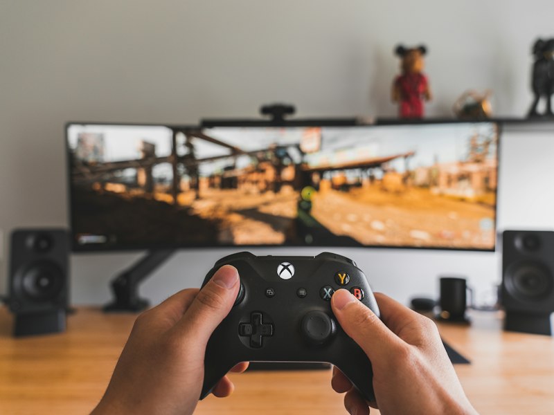 Close-up of controller and handwritten review notes